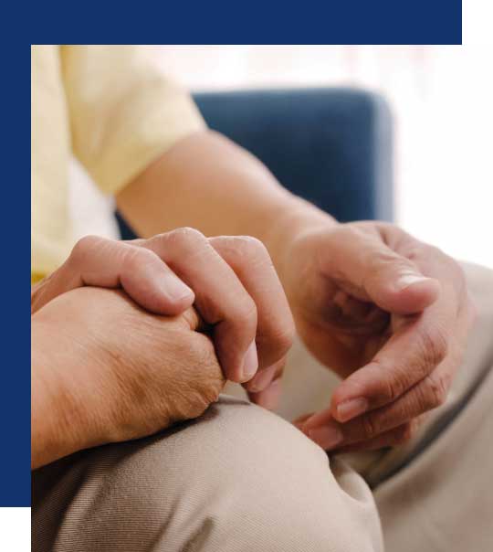 Couple holding hands during mesothelioma claim support