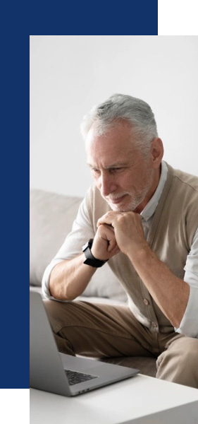 Older man researching asbestos lung cancer claim