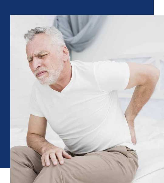 Man with back pain from mesothelioma symptoms