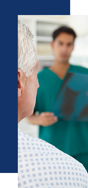Doctor checking report for mesothelioma diagnosis