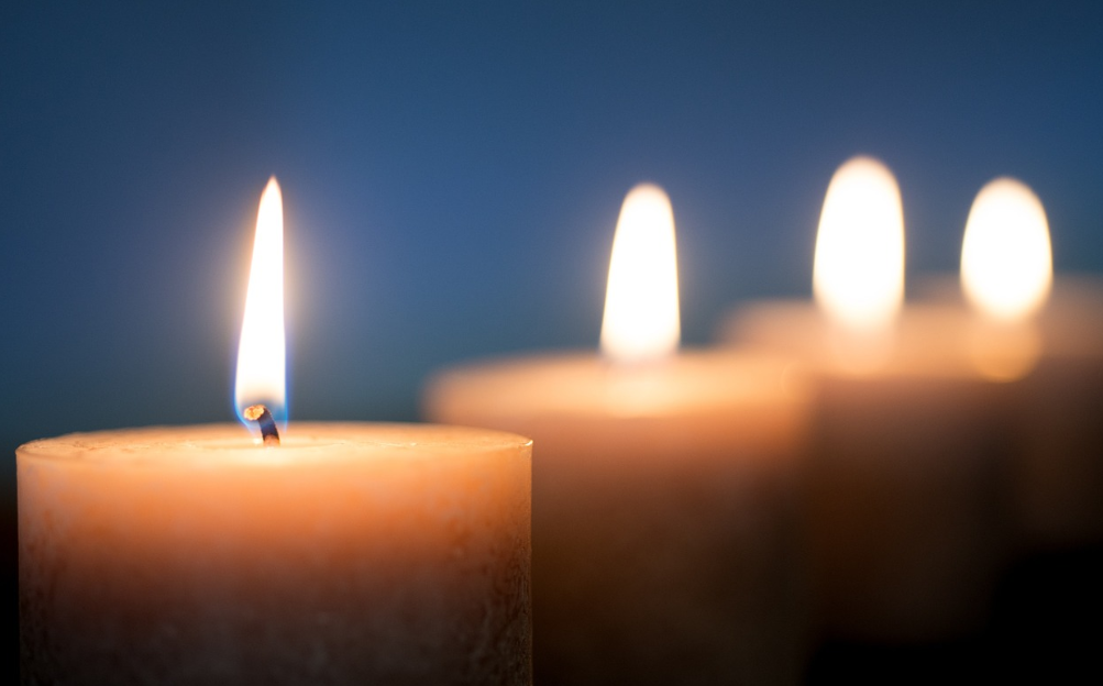 Picture of four candles burning